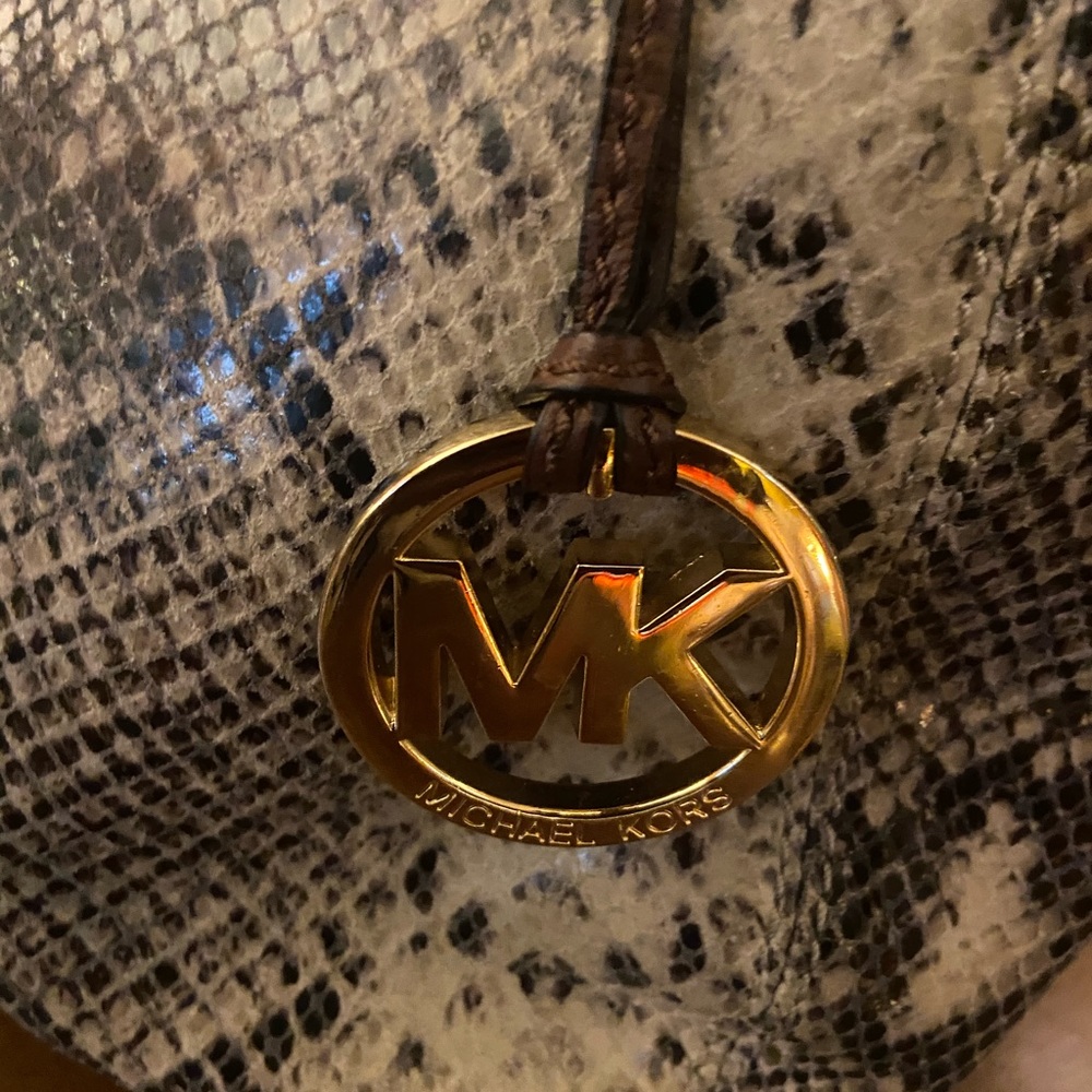 Micheal Kors reptile print. This purse is beautiful!!